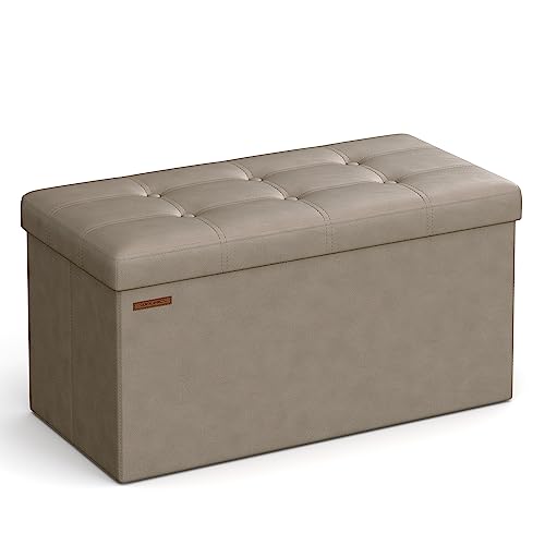 SONGMICS 30 Inches Folding Storage Ottoman Bench, Storage Chest, Footrest, Coffee Table, Padded Seat, Faux Leather, Holds up to 660 lb, Light Taupe ULSF040R01